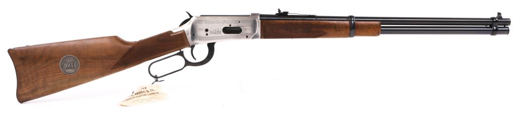 WINCHESTER MODEL 1894 WELLS FARGO .30-30 CARBINE: WINCHESTER MODEL 1894 WELLS FARGO .30-30 CARBINE Winchester Model 1894 Wells Fargo Edition .30-30 Win Lever Action Carbine. The carbine features a checkered walnut stock, an acid etched design featuri