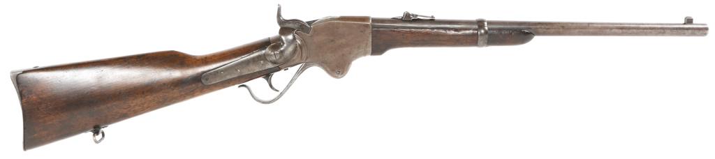 SPENCER MODEL 1865 .52 CAL SADDLE RING CARBINE: SPENCER MODEL 1865 .52 CAL SADDLE RING CARBINE Spencer model 1865 .52 caliber saddle ring carbine. Rifle features 20" round barrel, rear ladder sight (graduated from 200-900 meters) varnished walnut s