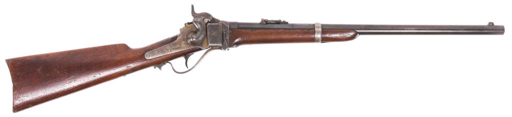 SHARPS NEW MODEL 1863 .50-70 GOVT. CARBINE: SHARPS NEW MODEL 1863 .50-70 GOVT. CARBINE Sharps New Model 1863 .50-70 Govt. falling block carbine. Carbine features walnut stock, 22" 3-groove rifled barrel, and saddle ring. Barrel marked: "New Mod