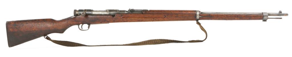 WWII JAPANESE KOISHIKAWA TYPE 38 ARISAKA RIFLE: WWII JAPANESE KOISHIKAWA TYPE 38 ARISAKA RIFLE Koishikawa arsenal Arisaka model type 38 bolt action rifle. Chambered in 6.5mm. Mum partially ground. Bayonet lug stamped 433. Metal butt plate. Caliber 