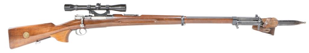 1903 CARL GUSTAFS MODEL 1896 6.5x55mm RIFLE: 1903 CARL GUSTAFS MODEL 1896 6.5x55mm RIFLE 1903 Carl Gustafs Gevarsfaktori model 1896 6.5x55mm bolt-action rifle, with model 1896 bayonet, and scabbard. Wooden stock, and blued finish. Receiver ring 