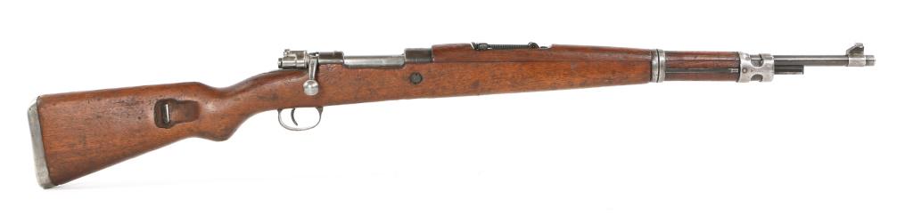 POST-WWII YUGOSLAVIAN ZASTAVA MODEL M48 8mm RIFLE: POST-WWII YUGOSLAVIAN ZASTAVA MODEL M48 8mm RIFLE Post WWII Yugoslavian Zastava model M48 8mm bolt-action rifle. Rifle features wooden stock, blued finish, bayonet lug, metal buttplate, and sling moun
