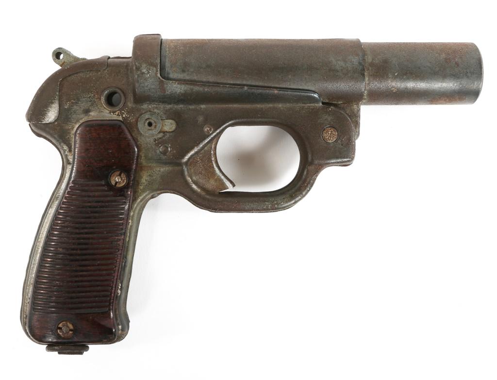 WWII GERMAN MODEL LP-42 26.6mm FLARE PISTOL: WWII GERMAN MODEL LP-42 26.6mm FLARE PISTOL WWII German model LP-42 26.6mm break-over flare pistol. Bakelite grips. "wa" ( Hasag Hugo Schneider AG) makers mark stamped on left side of frame. "WaAA10" 