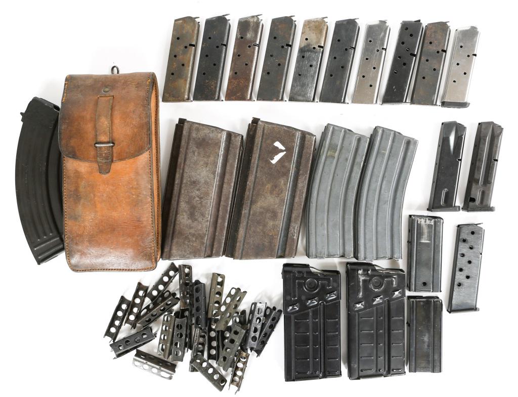 RIFLE AND HANDGUN MAGAZINE LARGE LOT: RIFLE AND HANDGUN MAGAZINE LARGE LOT One Japanese made N.V.S. M1 carbine 15rd magazine, and one "R-C" stamped 15rd M1 carbine magazine. Two 20rd Ar-15 magazines, made by La Belle Ind., and Parsons. Tw