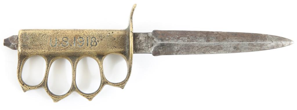 US MODEL 1918 MARK I TRENCH KNIFE BY AU LION: US MODEL 1918 MARK I TRENCH KNIFE BY AU LION French manufactured version of the US M1918 Mark I trench knife. Ricasso stamped with a recumbent Lion mark and the words " Au Lion". Blade Length: 6 3/8" 