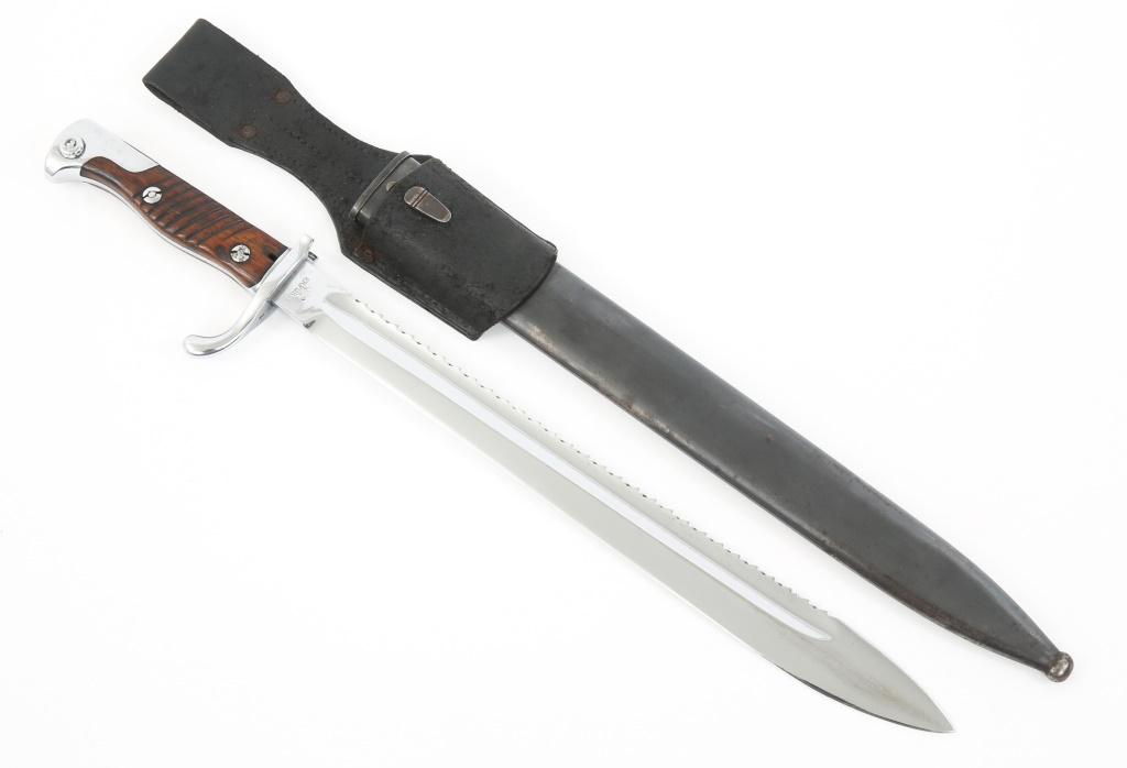 WWI GERMAN S98 SAWBACK BUTCHER BAYONET WITH FROG: WWI GERMAN S98 SAWBACK BUTCHER BAYONET WITH FROG WWI Imperial to Weimar German S98/05 Sawback Butcher's Blade Bayonet with Scabbard & Frog. Chromed bright blade with "ERFURT" marking on the ricasso. M