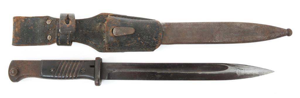 WWII GERMAN K98 COMBAT BAYONET WITH LEATHER FROG: WWII GERMAN K98 COMBAT BAYONET WITH LEATHER FROG WWII German K98 combat bayonet by WKC serial " 515 i ". Mismatch scabbard serial " 749 C". leather frog. Blade Length: 10" Overall Length: 15.1/8"