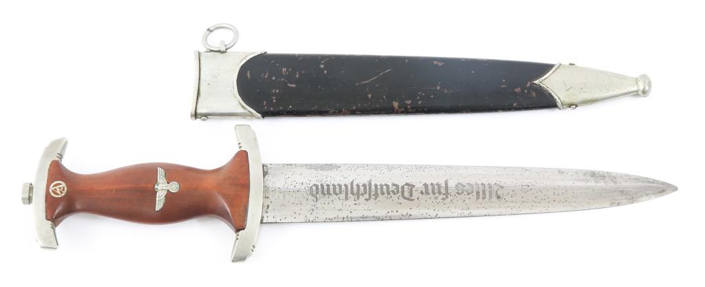 WWII GERMAN 1933 PATTERN SA DAGGER MARKED: WWII GERMAN 1933 PATTERN SA DAGGER MARKED WWII German 1933 Pattern SA Dagger. Pre - RZM. Maker marked blade which reads "CARL SCHMIDT SOHN A.-G. SOLINGEN" in circular writing around church logo. Blade