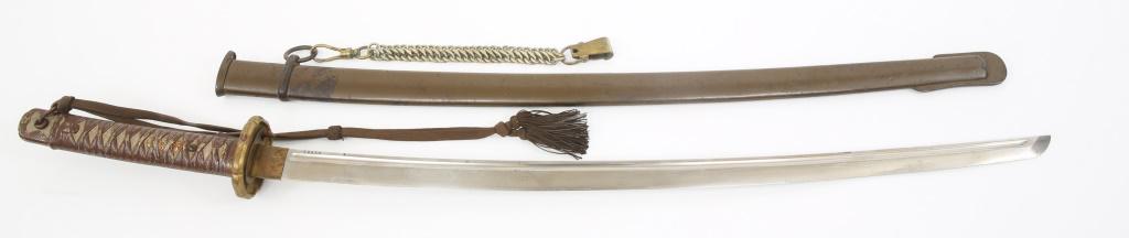 WWII JAPANESE NCO TYPE 95 SHIN GUNTO KATANA SWORD: WWII JAPANESE NCO TYPE 95 SHIN GUNTO KATANA SWORD WWII Japanese NCO's Type-95 Shin Gunto Katana Sword. Unmatched serial numbers. Blade is bright and marked "28924" next to stamped pictorial marking on