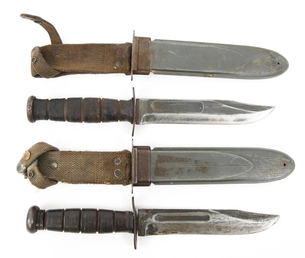WWII USN MK 2 KABAR FIGHTING KNIVES LOT OF 2: WWII USN MK 2 KABAR FIGHTING KNIVES LOT OF 2 Lot of 2 WWII U.S.N Mark II Ka-Bar fighting knives in scabbards marked "U.S.N. MK 2". Stacked leather handles. Blade Length: 7" Overall Length: 12"