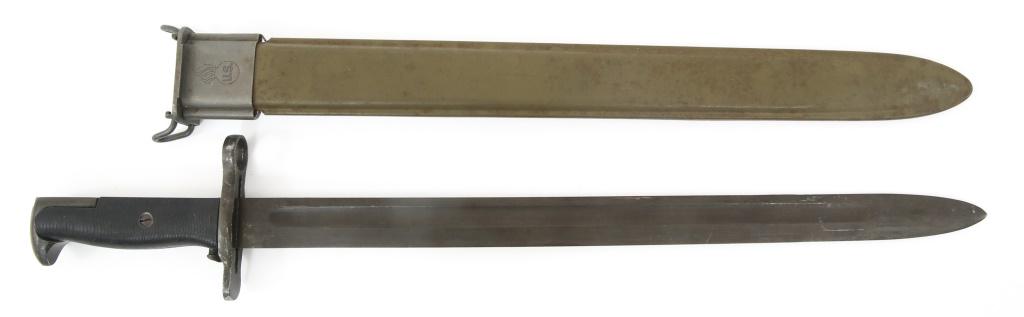 WWII US M1942 LONG BAYONET WITH SCABBARD: WWII US M1942 LONG BAYONET WITH SCABBARD WWII US Army model 1942 long bayonet with M3 OD scabbard. Parkerized blade stamped on the ricasso " U.F.H, US 1943 " with flaming grenade. Black plastic / bake