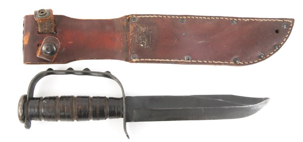 WWII FIELD MODIFIED USMC CAMILLUS FIGHTING KNIFE: WWII FIELD MODIFIED USMC CAMILLUS FIGHTING KNIFE USMC Mark 2 fighting knife, marked " USMC " & " CAMILLUS. NY " on the other side of the ricasso. Field modified to have knuckle duster hand guard. Blad