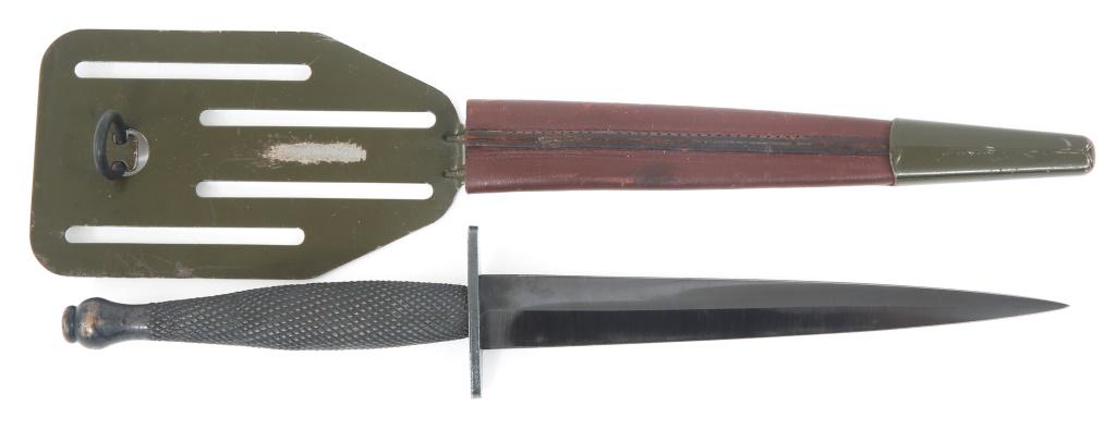 WWII US OSS STILETTO PANCAKE FLIPPER KNIFE: WWII US OSS STILETTO PANCAKE FLIPPER KNIFE WWII US OSS Stiletto Fighting Knife with Pancake Flipper Sheath. Blued blade with visible cross grain. 2 inch oval crossguard. Checkered grip handle. Pancake