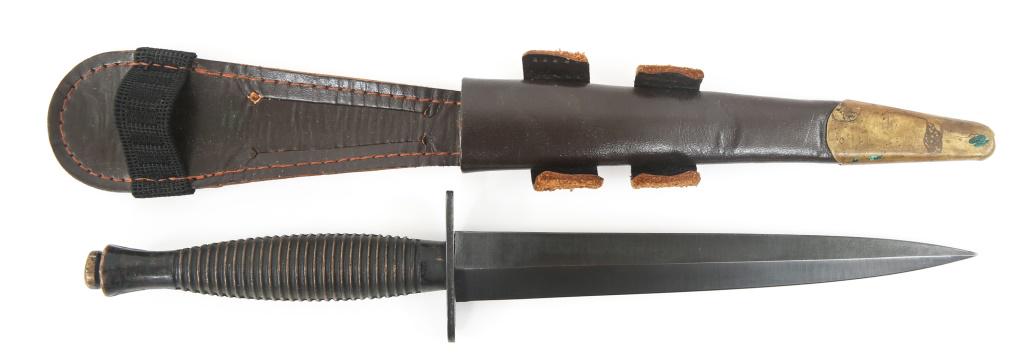 POST-WWII 3RD PATTERN FS COMMANDO FIGHTING DAGGER: POST-WWII 3RD PATTERN FS COMMANDO FIGHTING DAGGER Post - WWII Fairbairn Sykes Third Pattern marked on the top of the crossguard " S. COOPER SHEFFIELD ENGLAND". Blued blade. Brown leather sheath with b