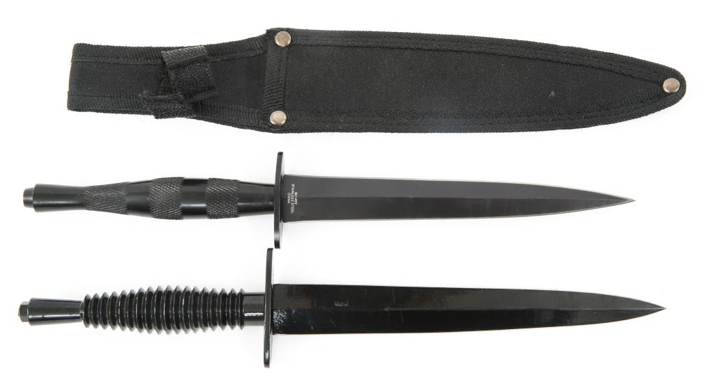 REPRODUCTION F.S. BRITISH COMMANDO KNIVES LOT OF 2: REPRODUCTION F.S. BRITISH COMMANDO KNIVES LOT OF 2 One has sheath included, marked "BUDK". The other is painted all black. Blade Length: 7" Overall Length: 11.25"