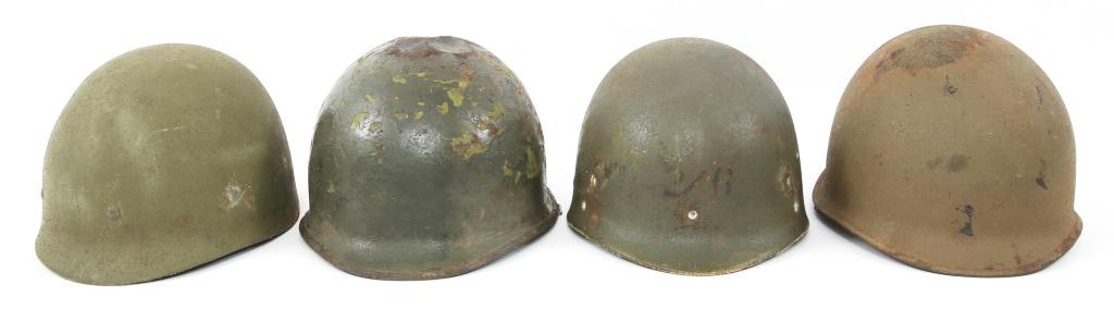 US M1 HELMETS WITH LINERS KOREA VIETNAM LOT OF 4: US M1 HELMETS WITH LINERS KOREA VIETNAM LOT OF 4 (1) Painted shell, fixed bale, stars added later, named in white stencil on rear. (2) Swivel bale, rear seam inside of shell marked with the handwritte
