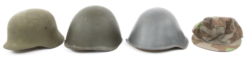 COLD WAR EASTERN BLOCK COMBAT HELMET & HAT LOT: COLD WAR EASTERN BLOCK COMBAT HELMET & HAT LOT 1- Hungarian M35/38 steel combat helmet, padded liner & chinstrap (one chinstrap stud is missing). 1- East German steel combat helmet, leather chinstrap 