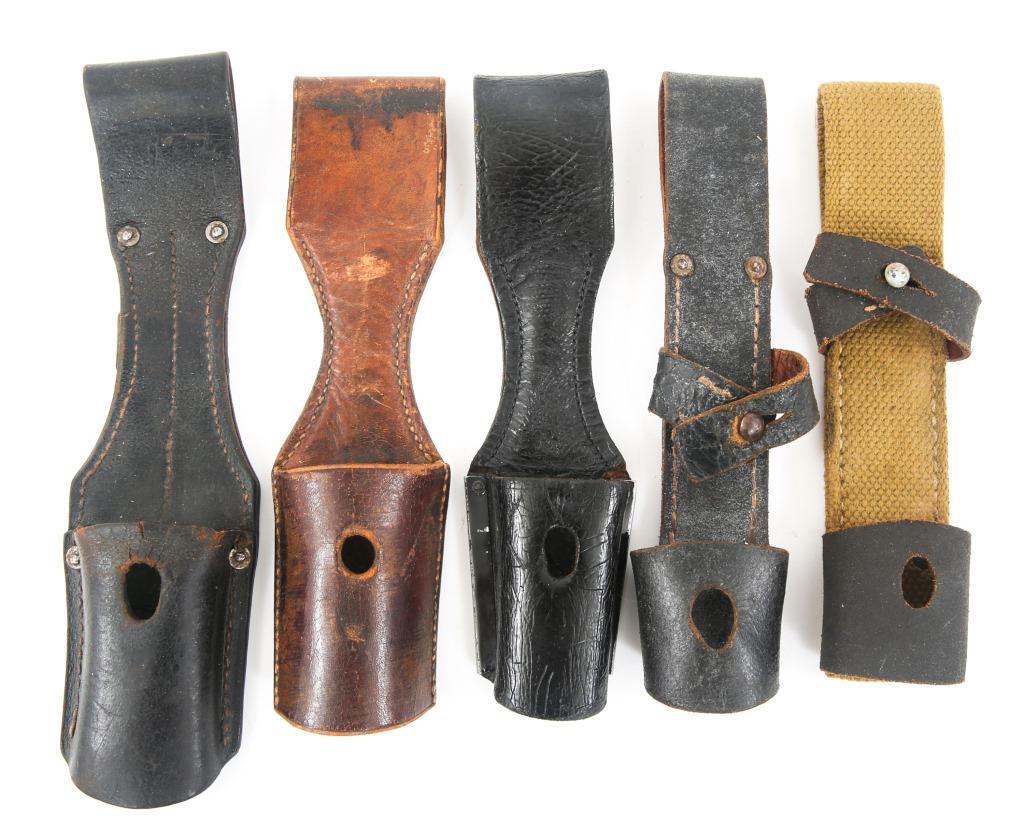 WWII TO POST WAR GERMAN BAYONET FROGS LOT OF 5: WWII TO POST WAR GERMAN BAYONET FROGS LOT OF 5 Bayonet frogs made of leather and canvas. Black leather frog with metallic rear frame is marked "D.R.P". Black leather frog is marked "01032310008". The 