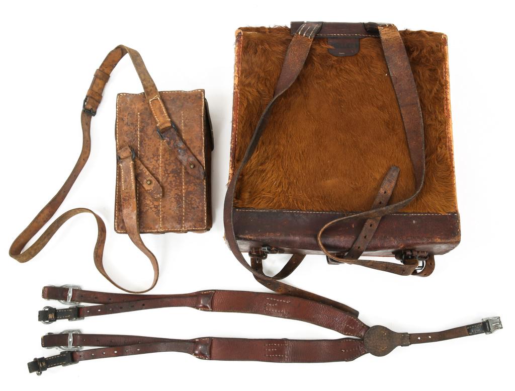 WWII SWISS PONY PACK & YUGO MP-40 MAG POUCH LOT: WWII SWISS PONY PACK & YUGO MP-40 MAG POUCH LOT Lot includes: WWII Swiss Army Pony Pack Tornister Rucksack named to Muller, maker mark stamped in between straps. Yugoslavian MP-40 fitting magazine pou