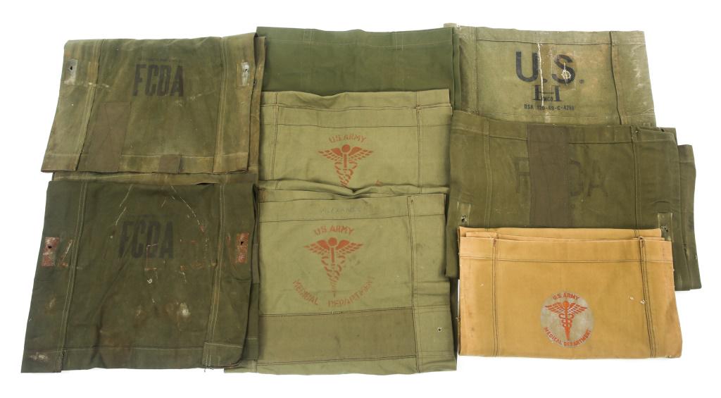 WWII TO KOREAN WAR US ARMY CANVAS STRETCHER LOT: WWII TO KOREAN WAR US ARMY CANVAS STRETCHER LOT Lot includes : WWII Khaki Canvas Stretcher Stenciled with the US Medical Department Decal, and many other OD Green Canvas stretchers with various stenci