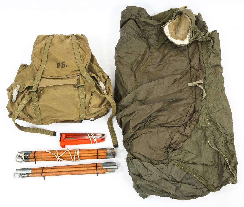 WWII US ARMY MOUNTAIN TROOPS TENT & BACKPACK LOT: WWII US ARMY MOUNTAIN TROOPS TENT & BACKPACK LOT WWII US Army Mountain Troops lot. Includes 1- Mountain Troops double opening reversible ( white - OD green ) tent with poles and pegs, dated 1944; 1- M