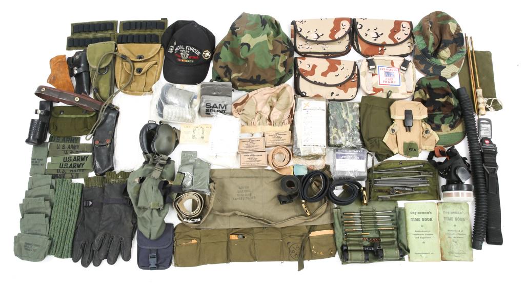 VIETNAM TO GULF WAR ERA US ARMY MILITARY GEAR LOT: VIETNAM TO GULF WAR ERA US ARMY MILITARY GEAR LOT Lot includes: Tactical medical kit, Gas mask, gloves, hats, cadet belts with buckles, M16A1 cleaning kits, bandoliers, webbing, civilian holsters and 