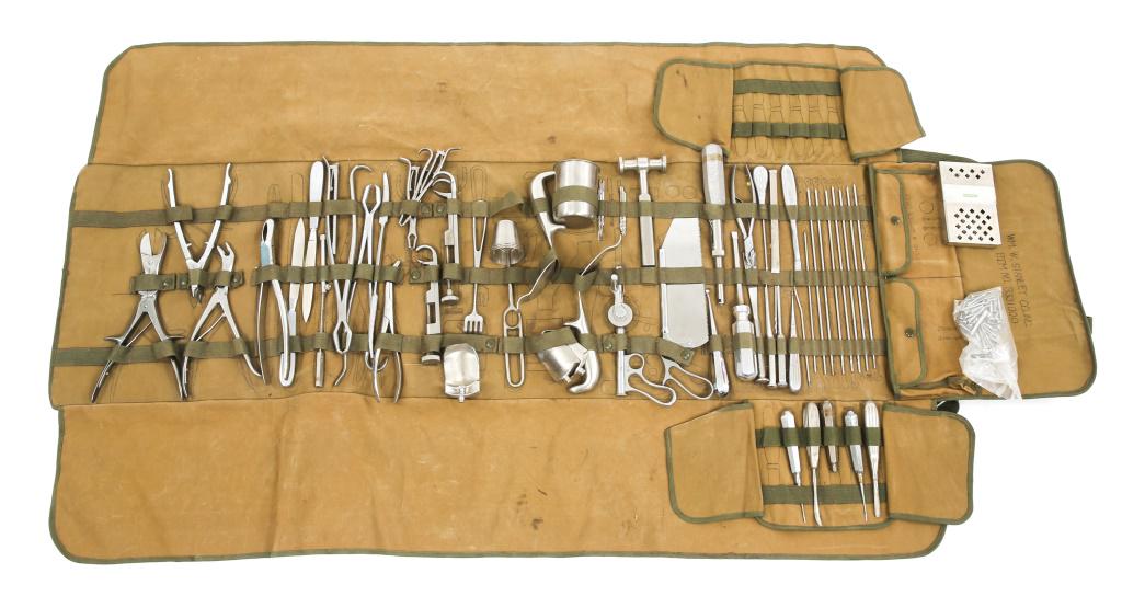 COLD WAR ERA US ARMY MEDICAL ORTHO SURGICAL KIT: COLD WAR ERA US ARMY MEDICAL ORTHO SURGICAL KIT Marked "Fracture & Amputations " on the exterior of canvas case, "WM. W. STANLEY CO, INC." is marked on inside of flap.