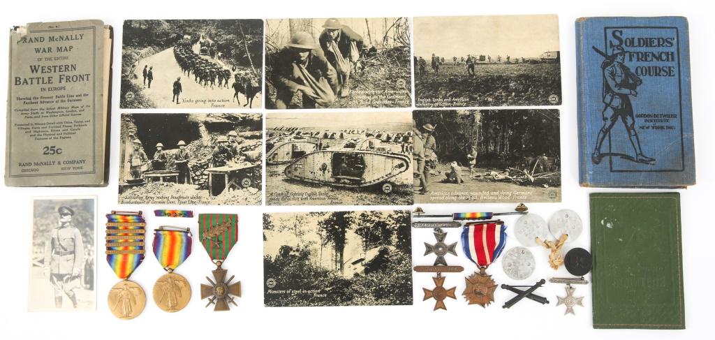 WWI US ARMY DOG TAGS MEDALS & MAP BOOK LOT: WWI US ARMY DOG TAGS MEDALS & MAP BOOK LOT Lot of WWI US Items. Lot includes: Chicago Daily News Postal Photo Postcards, Dog tags, Rand McNally fold out War Map, Solider's French Course, 5-spange vict