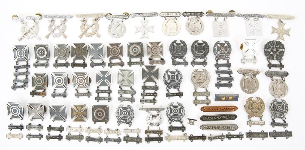 WWII TO MODERN US MILITARY MARKSMANSHIP MEDAL LOT: WWII TO MODERN US MILITARY MARKSMANSHIP MEDAL LOT Lot includes: Sharpshooter, Expert Rifleman. Some marksmanship medals are four tabs long. Some are for mortar, bayonet, recoilless rifle, pistol, carb