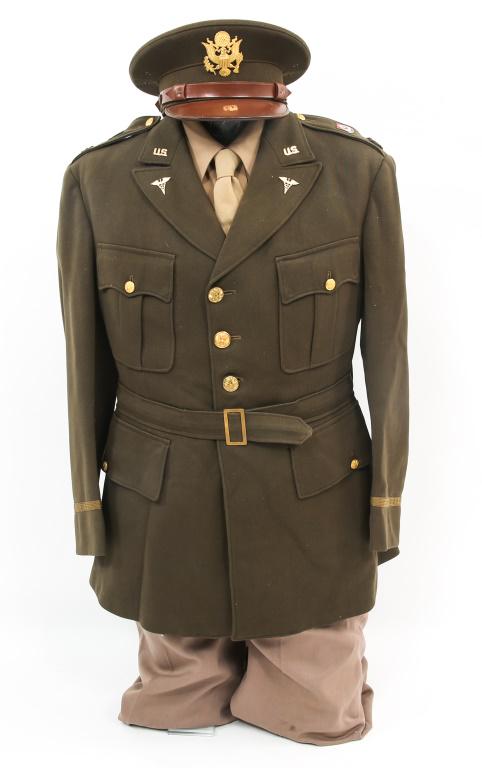 WWII US ARMY 46th ARMORED MEDICAL BATT OFF UNIFORM: WWII US ARMY 46th ARMORED MEDICAL BATT OFF UNIFORM WWII US Army 46th Armored Medical Battalion Officer dress uniform. Includes 1- Officer chocolate brown 4 pockets tunic with Off Medical collar, DUI c