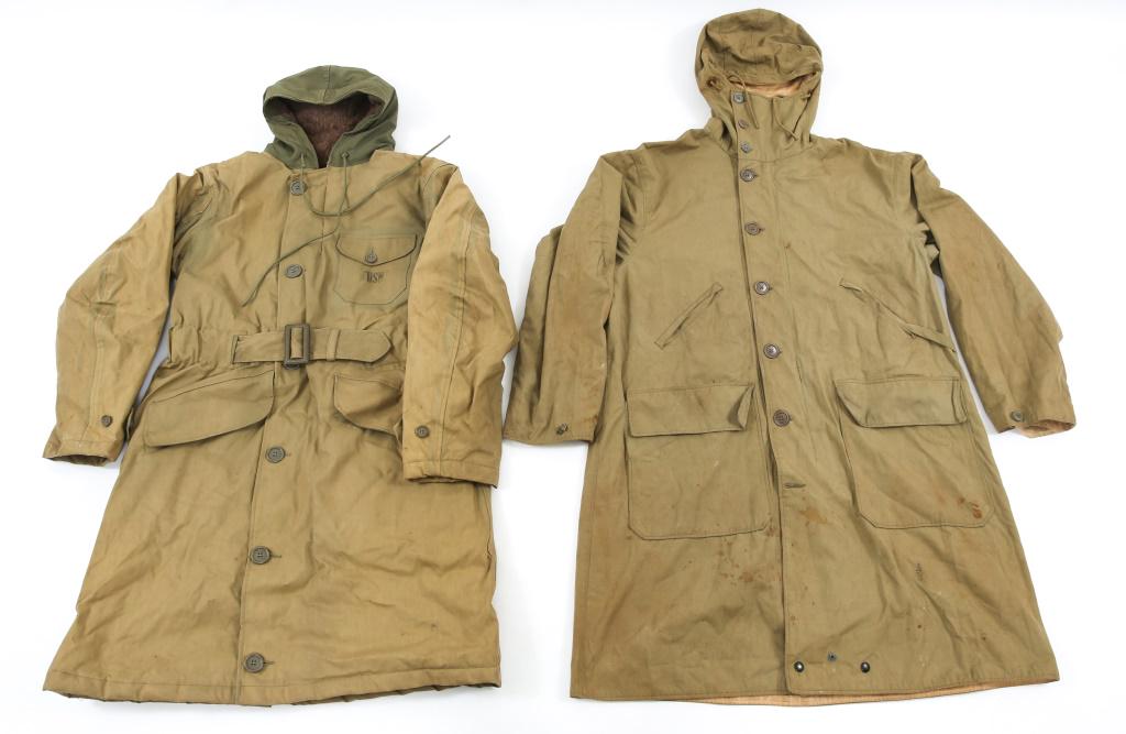 WWII US MOUNTAIN TROOPS & USN PARKA LOT OF 2: WWII US MOUNTAIN TROOPS & USN PARKA LOT OF 2 1- WWII US Navy deck jacket - long parka Alpaca fur, marked " Cap't S11 " on the back. 1- WWII US Army Mountain Troops reversible snow parka. Size: Medium