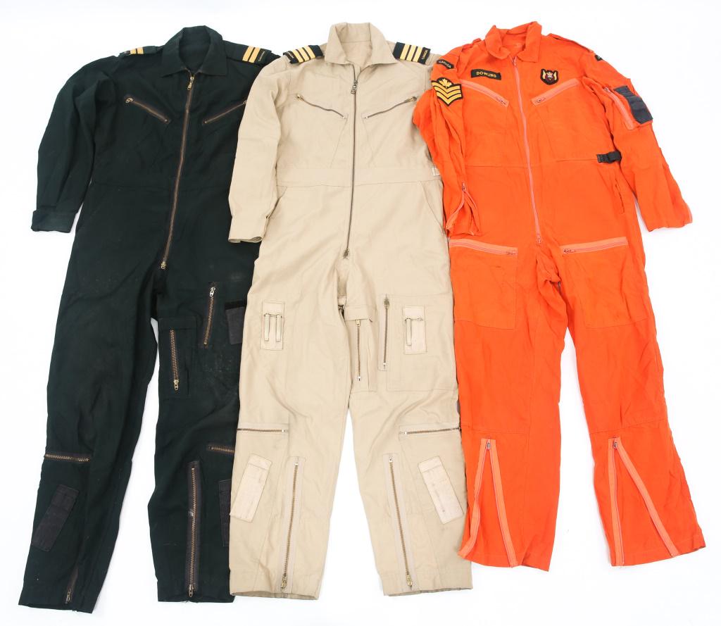 CANDIAN ROYAL AIR FORCE AVIATON COVERALLS LOT OF 3: CANDIAN ROYAL AIR FORCE AVIATON COVERALLS LOT OF 3 Canadian Royal Air Forces Aviation Crew Coveralls. Various rank and other insignia patches, and name title. Lot of 3. Khaki, black and orange colors.