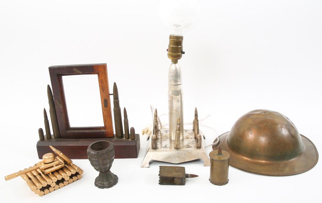 WWI WWII TRENCH ART LOT LAMP PHOTO FRAME & MORE: WWI WWII TRENCH ART LOT LAMP PHOTO FRAME & MORE World Wars & later. Lot includes Lamp with base decorated with USN insignia, stars light bulb and Brodie helmet lampshade, Wooden trench art frame, Matc