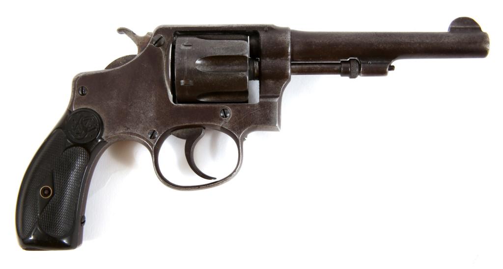 SMITH & WESSON MODEL 1903 2nd CHANGE REVOLVER: SMITH & WESSON MODEL 1903 2nd CHANGE REVOLVER Smith & Wesson model 1903 2nd Change .32 S&W Long Revolver. Gray/brown patina. Brown checkered hard rubber grips. 6-shot fluted cylinder. Matching serial