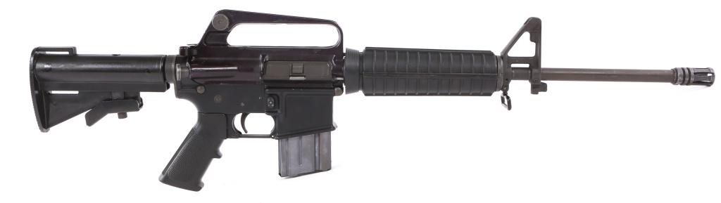 OLYMPIC ARMS MODEL CAR-AR 5.56X45mm CARBINE: OLYMPIC ARMS MODEL CAR-AR 5.56X45mm CARBINE Olympic Arms model CAR-AR .223 Rem / 5.56 NATO carbine. Black synthetic adjustable buttstock, carry handle, bayonet lug, bolt assist, dust cover, flash supp