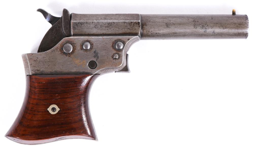 REMINGTON No.1 VEST POCKET "SAW HANDLE" DERRINGER: REMINGTON No.1 VEST POCKET "SAW HANDLE" DERRINGER Remington Elliot No.1 Vest Pocket .41 rimfire "Saw Handle" Derringer. Derringer features 4" half octagonal round barrel, walnut grips, and matching se
