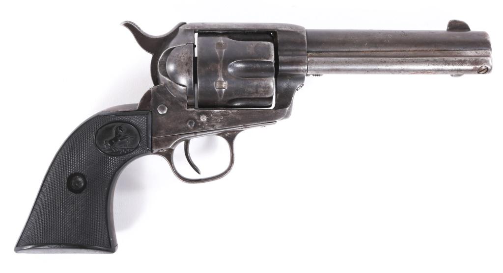 1883 COLT MODEL 1873 .45 LC SAA REVOLVER: 1883 COLT MODEL 1873 .45 LC SAA REVOLVER 1883 Colt model 1873 .45 Long Colt Single Action Army revolver. Gray/brown patina. Checkered hard rubber grips. Matching serial numbers on frame, trigger guard