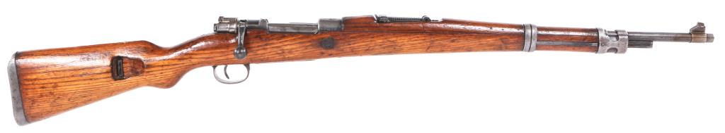 YUGOSLAVIAN ZASTAVA MODEL 48 8mm RIFLE: YUGOSLAVIAN ZASTAVA MODEL 48 8mm RIFLE Yugoslavian Zastava model 48 8mm Mauser bolt action Rifle. Yugoslavian crest and "M48" marked on receiver ring. "K34768" is marked on the bolt. Non-matching seri