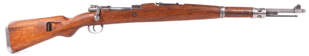 YUGOSLAVIAN CONTRACT ZASTAVA M48 8mm RIFLE: YUGOSLAVIAN CONTRACT ZASTAVA M48 8mm RIFLE Yugoslavian Contract Zastava M48 8mm bolt-action Rifle. Wooden stock, blued finish, adjustable rear sight, bayonet lug, and matching serial numbers on stock,