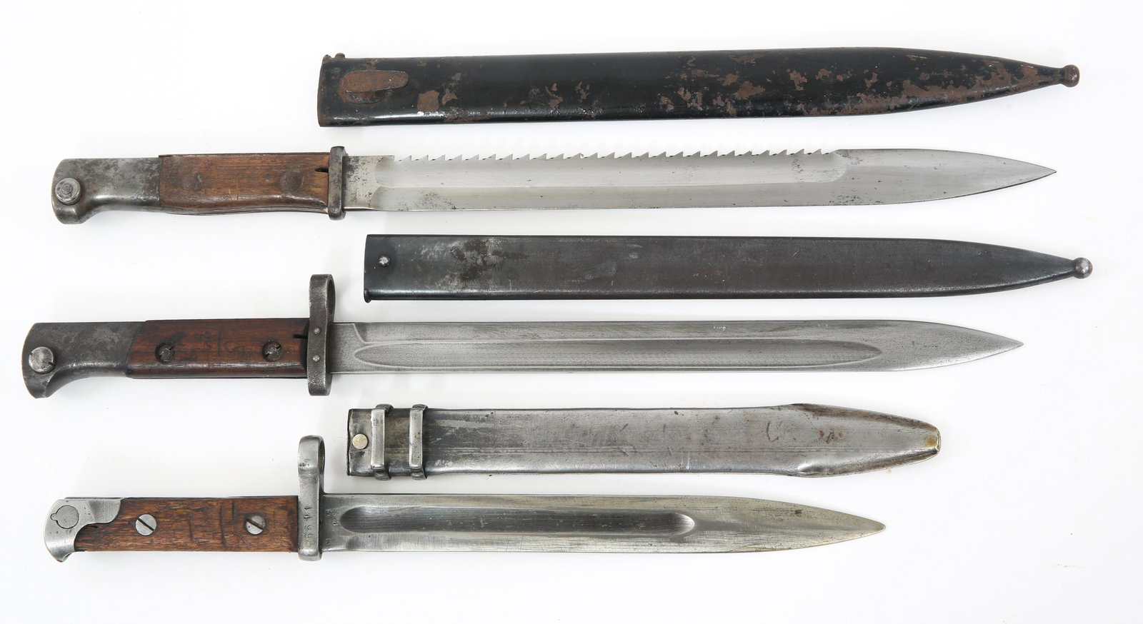WWI - WWII GERMAN CZECH & AUSTRIAN BAYONETS: WWI - WWII GERMAN CZECH & AUSTRIAN BAYONETS WWI to WWII German Czech & Austrian bayonets lot of 3. All accompanied by steel scabbards. (1) M1895 Austrian bayonet, wood grips. Blade is 9 3/8" , 14" ove