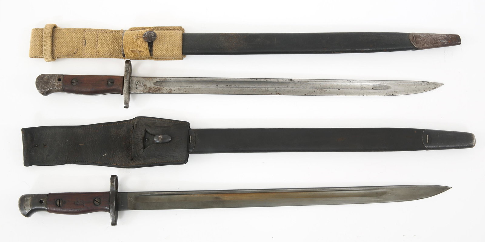WWI BRITISH M1907 BAYONET & SCABBARD LOT OF 2: WWI BRITISH M1907 BAYONET & SCABBARD LOT OF 2 WWI British Pattern 1907 Bayonets with Scabbards Lot of 2. (1) Bright blade, blued ricasso marked with the date 1907 Mfg "WILKINSON" and broad arrow. Stam