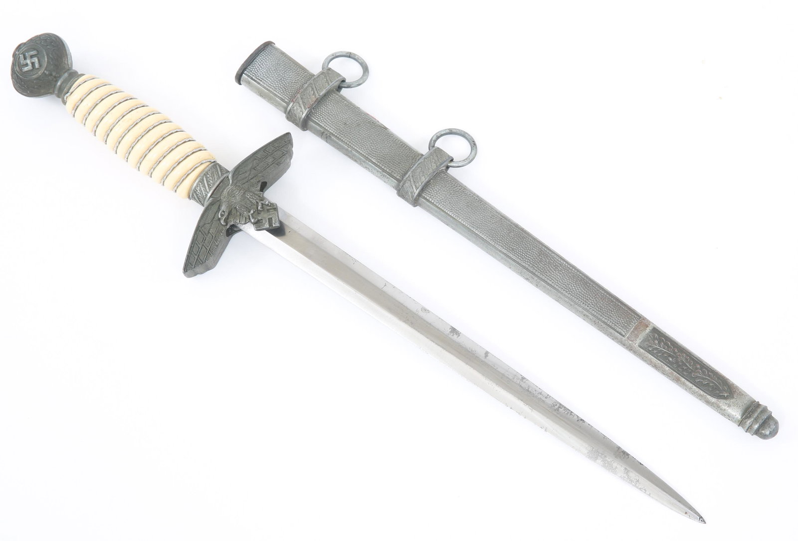 WWII 2ND MODEL LUFTWAFFE PARTS DAGGER BY WKC: WWII 2ND MODEL LUFTWAFFE PARTS DAGGER BY WKC WWII German 2nd model Luftwaffe officer's parts dagger with scabbard. Bright blade, marked with WKC logo at the ricasso. Leather buffer pad. Wire wrapped h
