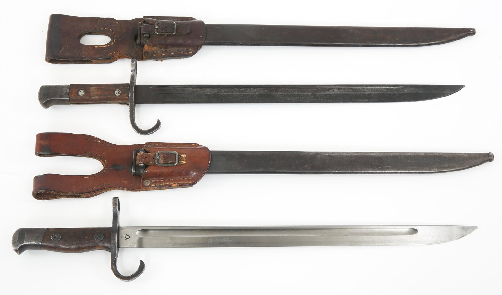 WWII IMPERIAL JAPANESE TYPE 30 BAYONETS LOT OF 2: WWII IMPERIAL JAPANESE TYPE 30 BAYONETS LOT OF 2 WWII Imperial Japanese Type 30 Arisaka Bayonets with Scabbards & Frogs Lot of 2. (1) Bright fullered blade, ricasso stamped with Tokyo arsenal / Mfg ma