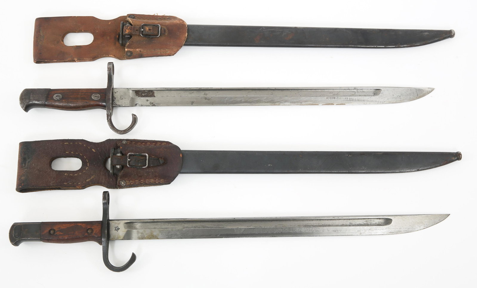 WWII IMPERIAL JAPANESE TYPE 30 BAYONETS LOT OF 2: WWII IMPERIAL JAPANESE TYPE 30 BAYONETS LOT OF 2 WWII Imperial Japanese Type 30 Arisaka Bayonets with Scabbards & Frogs Lot of 2. (1) Bright fullered blade, ricasso stamped with Tokyo arsenal / Mfg ma