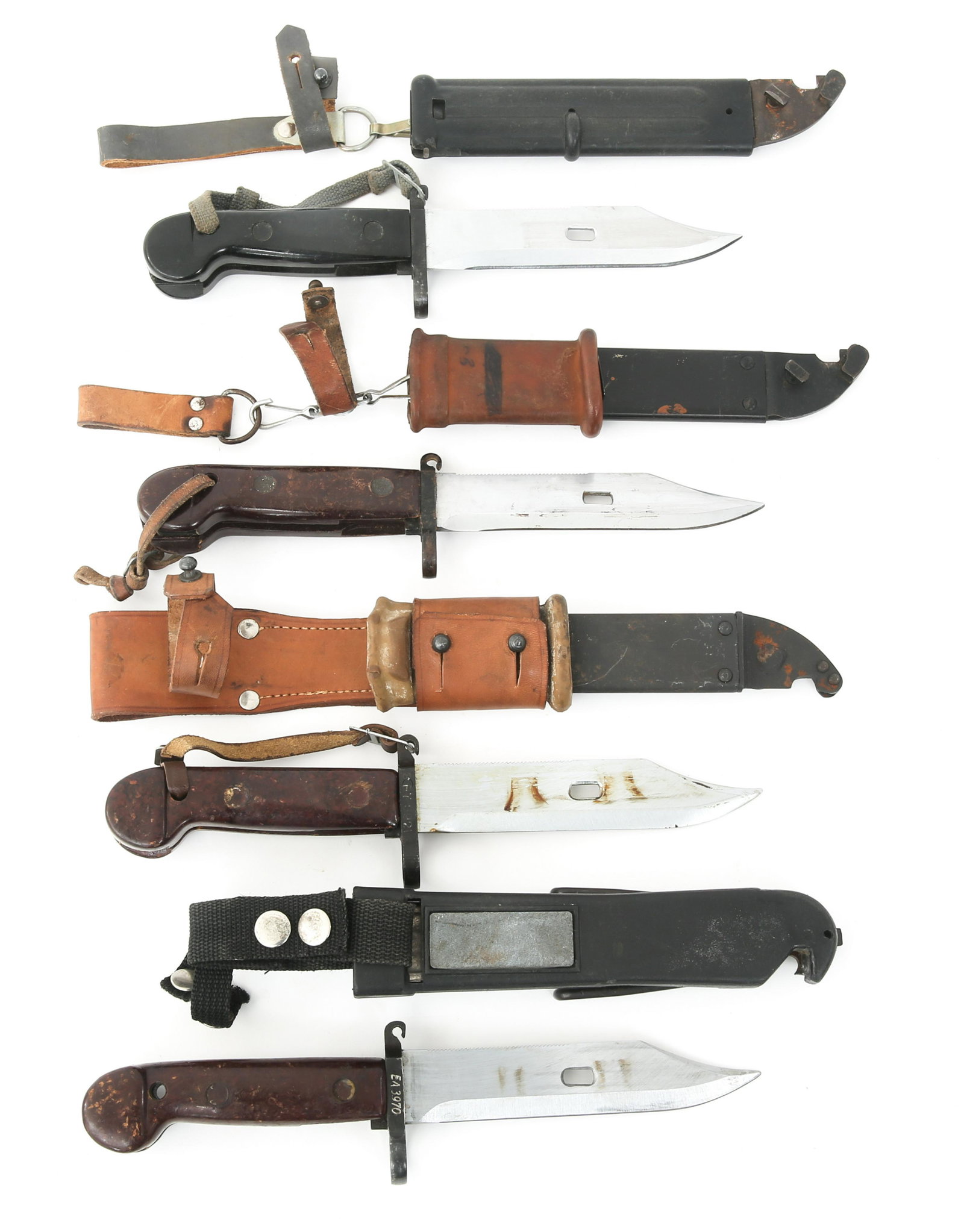 AKM RIFLE TYPE I RIFLE BAYONETS LOT OF 4: AKM RIFLE TYPE I RIFLE BAYONETS LOT OF 4 AKM Rifle Type I knife bayonets lot of 4. Two bayonets bear leather frogs. Various types of Type I & Type II sheaths. Bayonet sits loosely in the plastic sheat