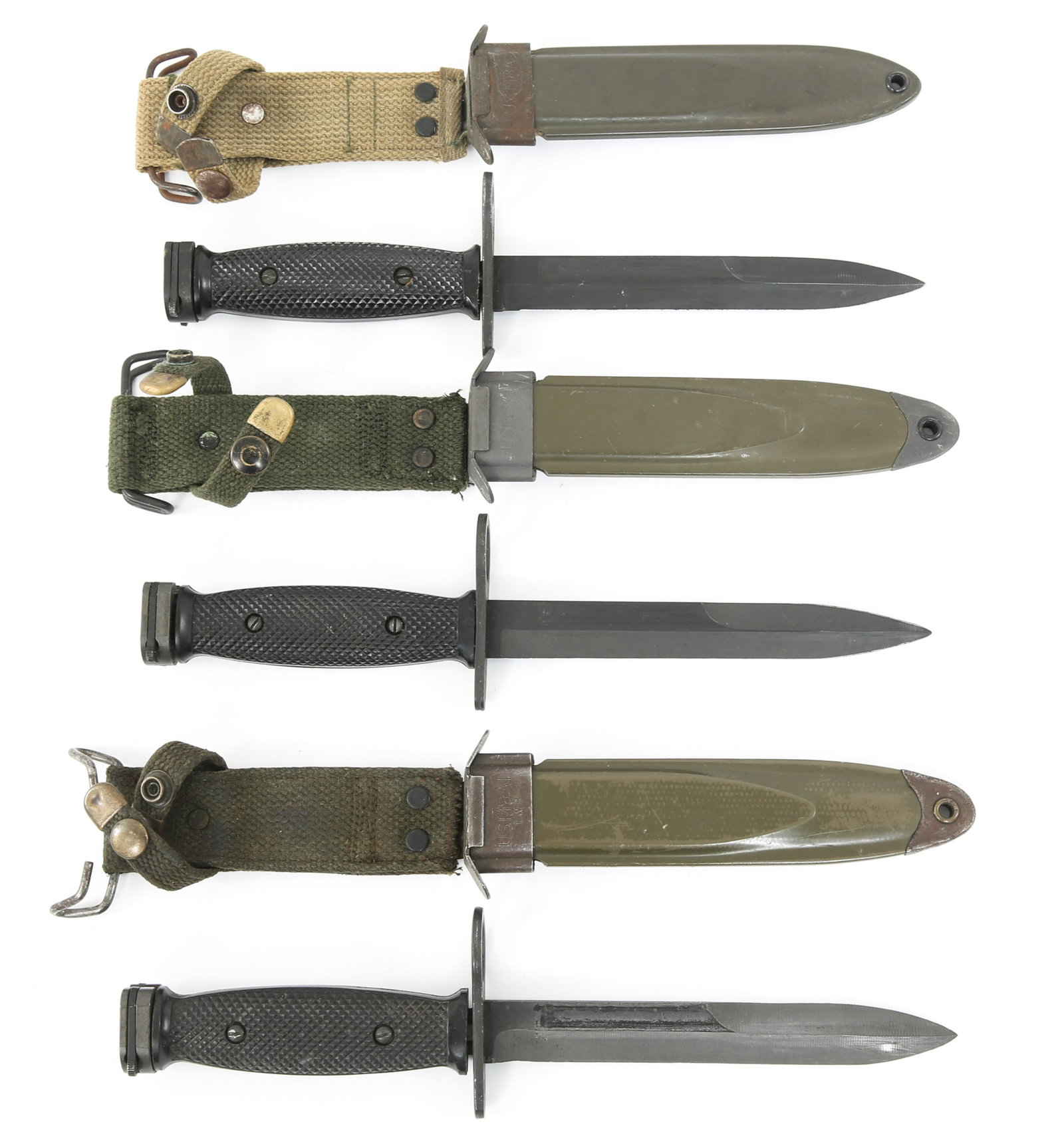 VIETNAM WAR ERA US ARMY M7 BAYONETS LOT OF 3: VIETNAM WAR ERA US ARMY M7 BAYONETS LOT OF 3 Vietnam War era US Army M7 bayonets with sheaths lot of 3. (1) M7 by BOC as marked on crossguard. In M8A1 TWB sheath. (1) M7 by Imperial as marked on cross