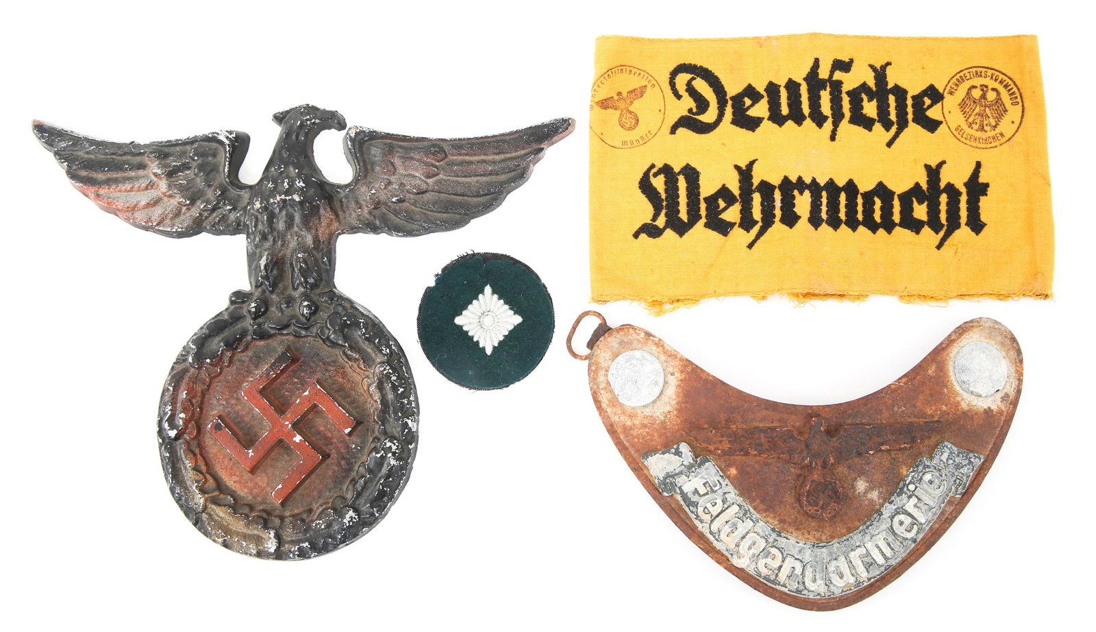 WWII GERMAN ARMBAND GORGET PATCH & PLAQUE: WWII GERMAN ARMBAND GORGET PATCH & PLAQUE WWII German Items Lot. Includes : (1) Armband on yellow fabric "Deutsche Wehrmacht" flanked by stamps. (1) Gorget plate "Feldgendarmerie". (1) Circular patch