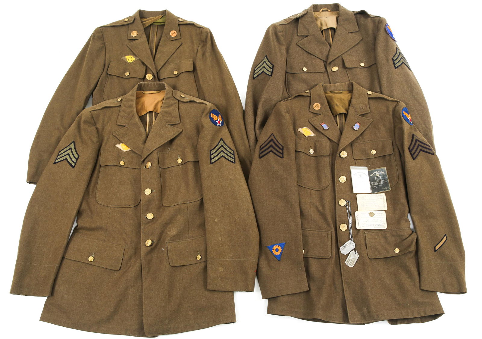 WWII USAAF ENLISTED - NCO DRESS TUNIC LOT OF 4: WWII USAAF ENLISTED - NCO DRESS TUNIC LOT OF 4 WWII US Army Air Force, Enlisted Man / NCO's uniform, lot of 4. 1- WWII Named Sergeant tunic with patches and insignia, Dogtags, Honorable Discharge mini