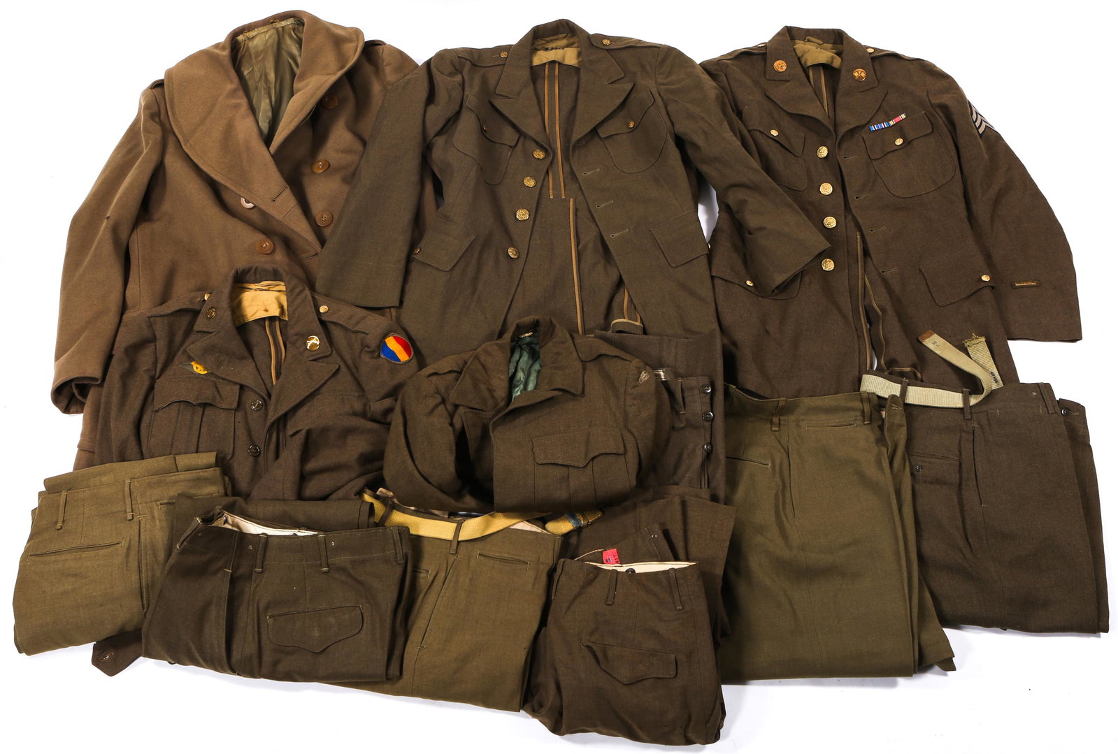 WWII US ARMY SERVICE & DRESS UNIFORMS LOT: WWII US ARMY SERVICE & DRESS UNIFORMS LOT WWII US Army Service & Dress Uniforms Lot. Includes Ike Jackets, Wool trench coat, pants and more. Size: S - L