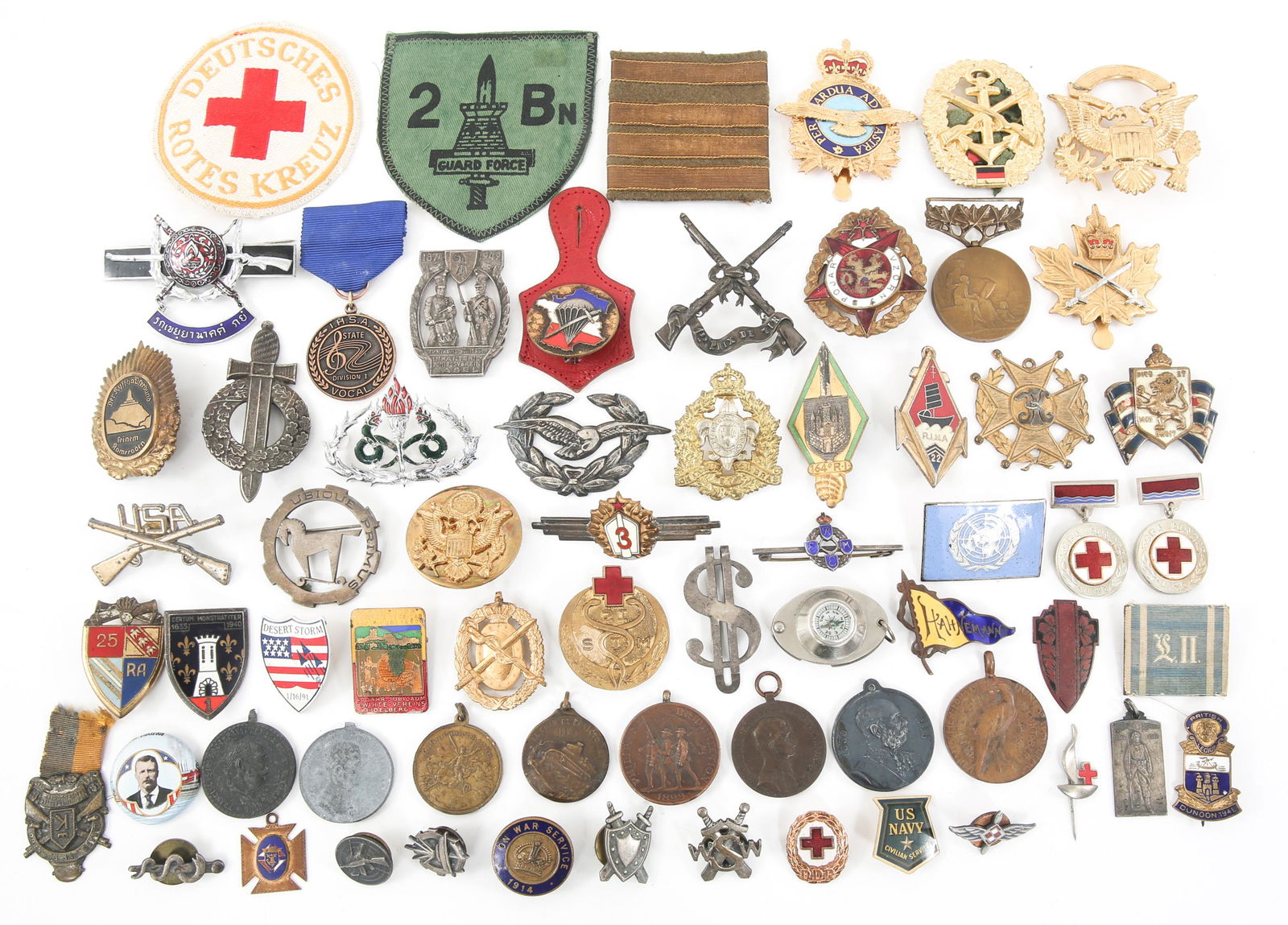 WWI TO GULF WARS PINS BADGES & PATCHES LOT: WWI TO GULF WARS PINS BADGES & PATCHES LOT WWII to Desert Storm US & World military pins, badges and patches. German Red Cross patch, 2nd Battalion Guard Force patch, WWI German medallion, Red Cross M